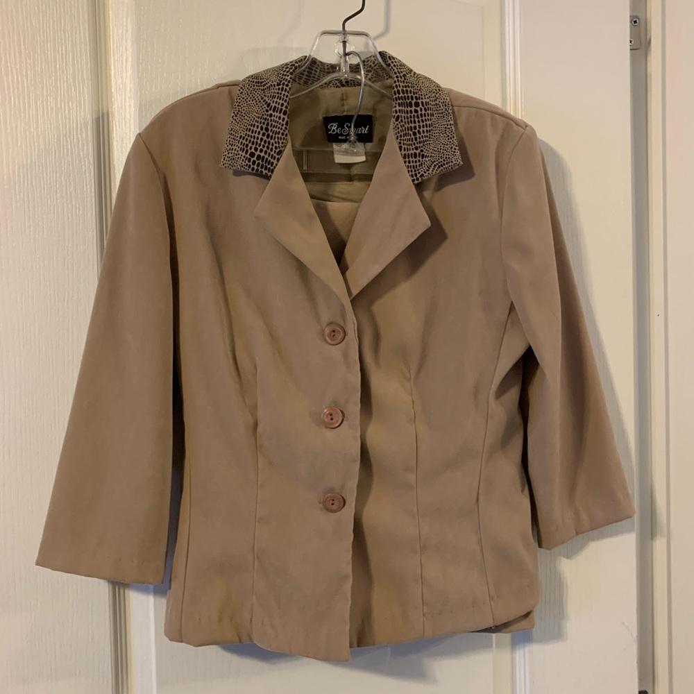 3 piece suit. Skirt, shirt and jacket/blazer